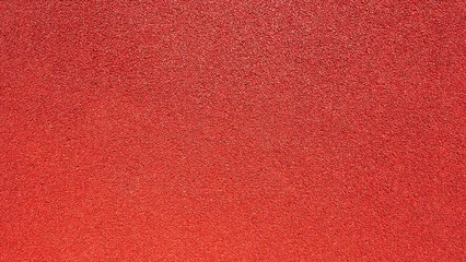 Fotobehang Spoorlijn Red running track texture background, Rubberized sports flooring surface for athletics and fitness  © RilakkuMaxx