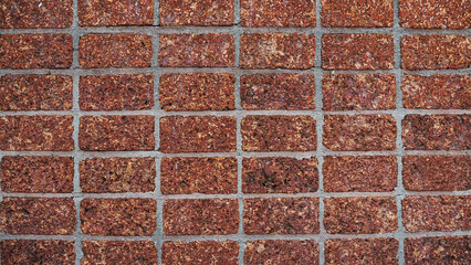 Red laterite brick wall texture background, Decorative porous stone masonry for garden and outdoor design