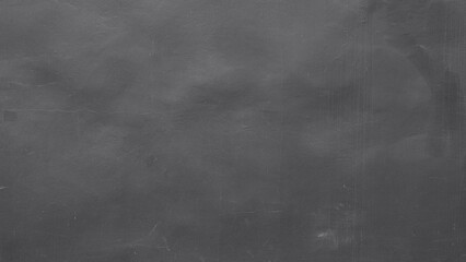 Dark grey cement wall texture background, smooth concrete surface for industrial and minimal interior design.