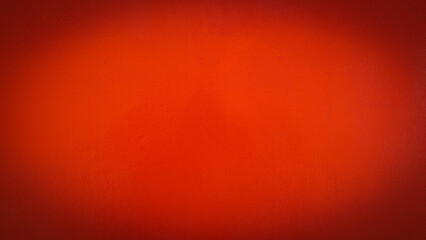 Vibrant red wall texture background with vignette, bright crimson cement surface for advertising and copy space