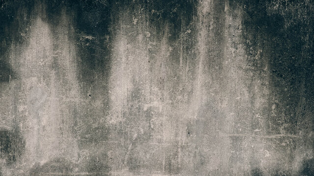 Grunge weathered concrete wall texture background, dirty old cement surface with dark stains and cracks.