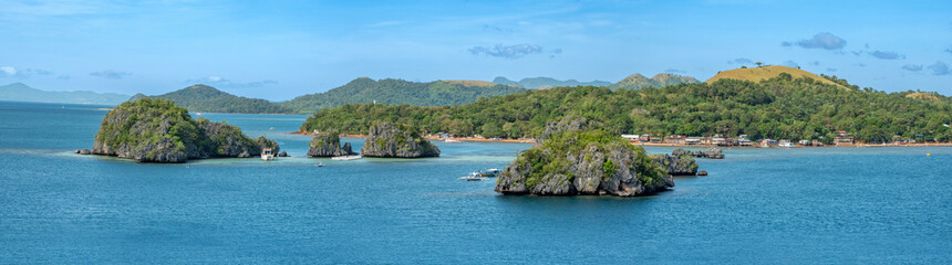 Panoramic view of the islands and rocky islets of Coron, with picturesque fishing villages,...