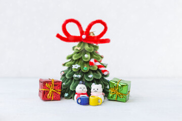 Two little snow man friend having Christmas tea party, decoration items, Christmas card background idea
