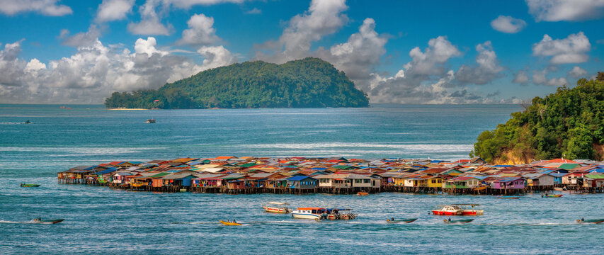 Picturesque coastal villages with houses on stilts on an island across from Kota Kinabalu harbor, ges, Sabah, Borneo, Malaysia