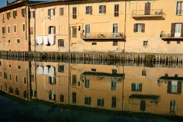 Rieti (Italy) - Houses of historic center of the Sabina's provincial capital with old houses reflections over Velino river.