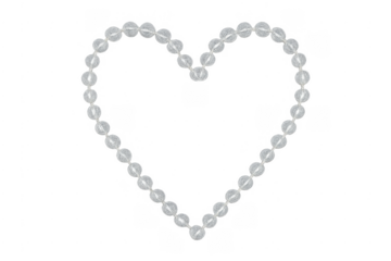Heart shape of clear faceted beads on transparent background