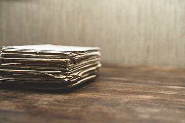 A stack of archived emails.Memories on paper.Keep old envelopes.