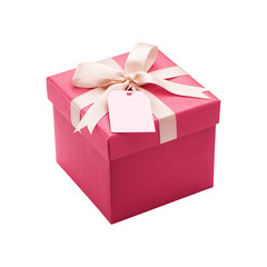 A wrapped pink gift box decorated with a festive gold ribbon and bow makes an isolated surprise package for a Christmas, birthday, or Valentine celebration
