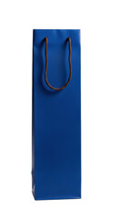 deep sapphire blue, matte paper wine gift bag with thick dark brown rope handles, perfectly vertical against a high-key white background and copy space. concept of luxury retail packaging