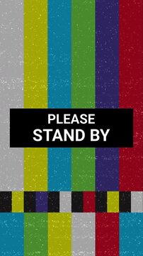 Retro TV Test Pattern Color Bars And Warning Text Please Stand By. Tv screen error broadcast. Classic television test pattern with colorful vertical bars and "PLEASE STAND BY" text. 4K Video.