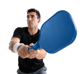 Zoom view of a man swinging a pickleball paddle close to the camera on isolated background