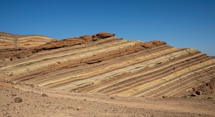 Colossal stratified rock layers stretch across an ancient arid landscape, revealing eons of tectonic forces and mineral deposition, ancient, wilderness, structure