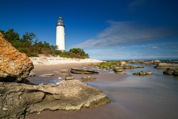 Fototapeta premium view of the historic Faro Lighthouse on the Swedish island of Faro in the Baltic Sea