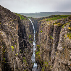 view of the Godafoss waterfall and gorge near Bjarnarfjordur in the West Fjords of Iceland