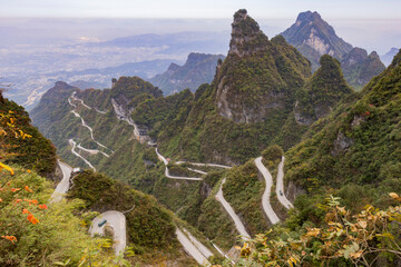 Tianmen Mountain with its pierced rock above the city of Zhangjiajie in Hunan, China.