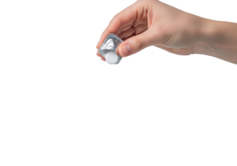 macro close-up of a caucasian woman's hand dropping a white effervescent tablet from a blister pack into clear water, transparent high-key studio background, concept of healthcare product efficacy