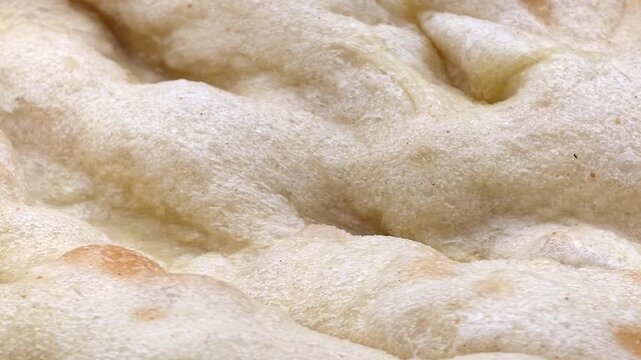 Pinsa dough texture close up. Traditional Italian food macro