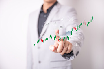 Business man with floating icon show uptrend in  investment