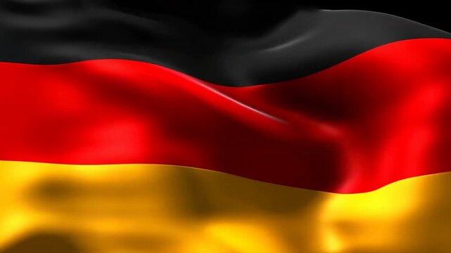German flag waving in the wind: dynamic closeup of national colors in motion