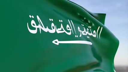Waving saudi arabian flag against clear sky capturing movement and symbolism