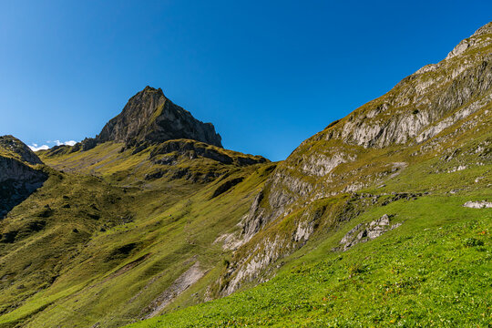 Majestic Mutterwangsjoch Mountain Panorama in Austrias Great Walser Valley Under Clear Skies