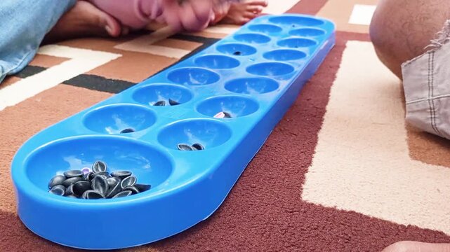 The ease and simplicity of the congklak (mancala) game has been very popular for thousands of years and is still played by various groups today, especially children when relaxing with their families.