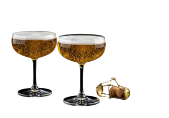 Two vintage crystal coupe glasses of effervescent golden champagne and a bottle on a jet-black reflective surface, extreme macro low key product studio photography, opulent festive celebration concept