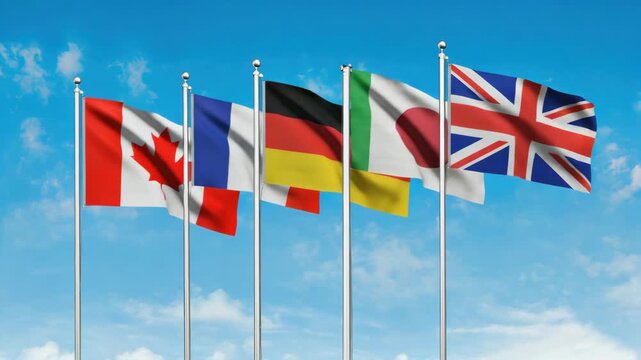 Colorful international flags on poles in a row