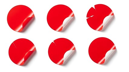 Six red stickers with peeling edges