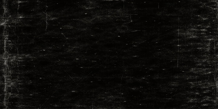 A dark grunge film background with a textured black stone wall pattern and alpha channel features a vintage rough paper surface for a dirty gray industrial backdrop