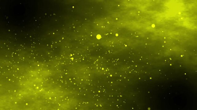 Beautiful abstract yellow smoky particles in a black background.Small round particles flowing from two sides for backgrounds.Attractive calm background video of glowing particles across the screen.