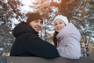 Joyful Pair Dressed For Cold Outdoor Weather, Bright Smiling Twins Amidst Snowy Park Background Scenery, Lively Cheerful Duo With Radiant Smiles Amid Frosty Winter Park Environment