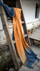 old wooden boat and chair on wooden deck