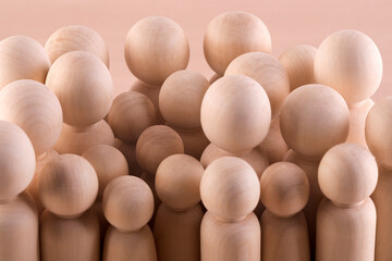 Large group of wooden people figurines