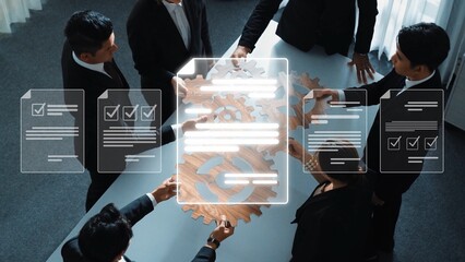 A diverse group of professionals in business attire engages in a collaborative meeting, examining project strategies and leveraging technology for insightful discussions. Raster