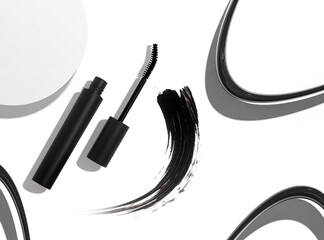 black mascara cosmetic makeup product mockup with flat lay view and ink brush stroke smudge swatch