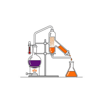 Distillation apparatus in a chemistry laboratory setup.