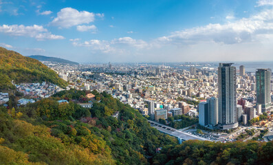Obraz premium Panorama of the modern city of Kobe from the Rokko mountain range, Kobe, Hyogo, Honshu, Japan