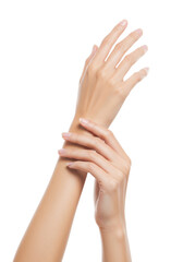 Elegant, slender young adult asian woman's hands with smooth, glowing skin and manicured nails, gently cupped against a transparent studio background with copy space, showcasing luxurious skin