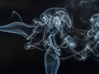 Abstract wisps of smoke gracefully swirling against a dark dramatic background