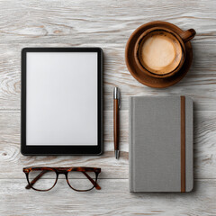 Organized Learning: Flat Lay of E-reader, Coffee, Eyeglasses, and Notebook on Wooden Desk