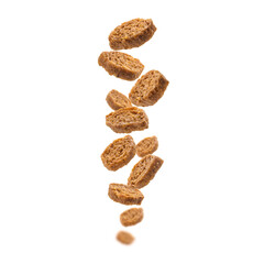 Bread croutons levitate on a white background