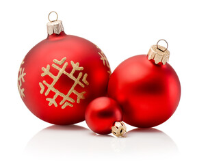 Three Christmas red baubles isolated on white background