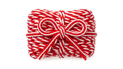 Decorative festive red and white string bow isolated for gift wrapping and Christmas holiday craft designs