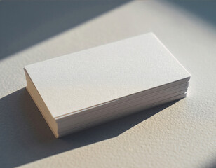 Blank business card stack mockup in natural light
