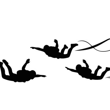 Three Skydivers In Freefall Silhouette Formation.