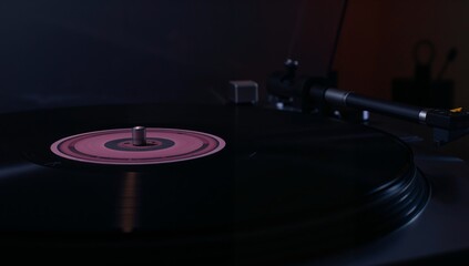 Vinyl Echoes in Dim Light, A Study of Tones and Textures on a Record Player.