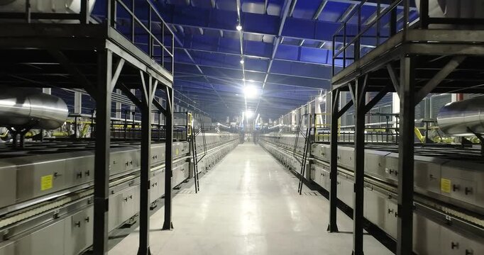 Roller Kiln for the Production of Ceramic Tiles. Firing. The roller kilns. Industrial drying for ceramics. Industrial kilns for Ceramic Tiles. Production line of a ceramic tile. Indoors. 
