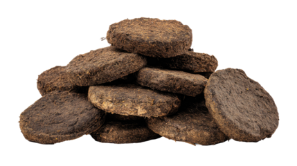 Heap of compressed peat briquettes