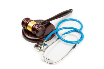 A stethoscope and hammer isolated on white background. Medical malpractice, personal injury lawyer,...